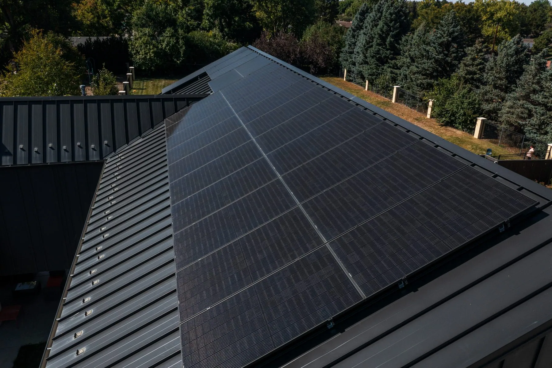 REC solar panels installed on a Colorado roof