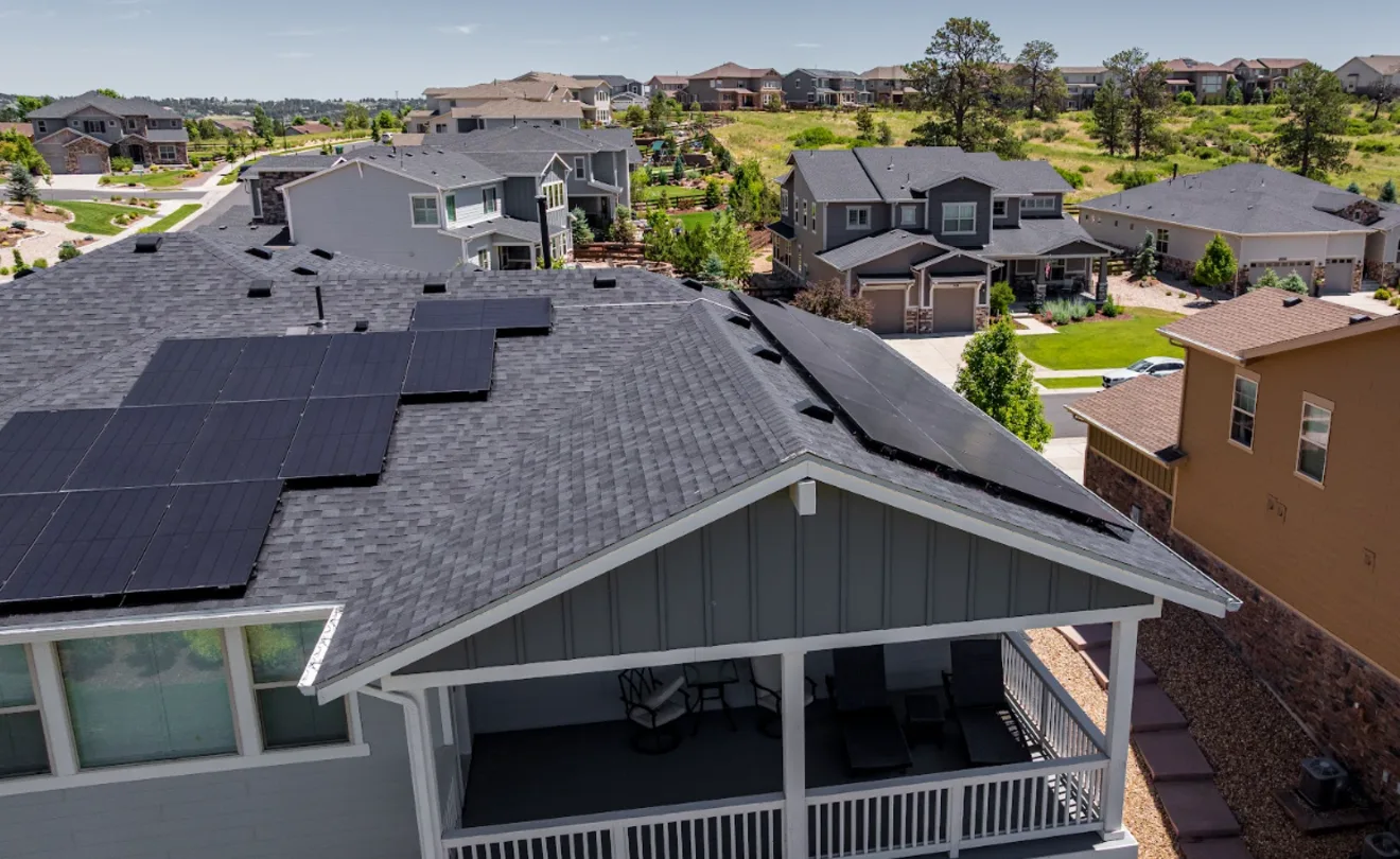 Aerial view of solar arrays across a Colorado residential neighborhood